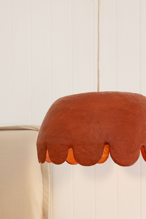 Close up of oversize Clay coloured pendant light
